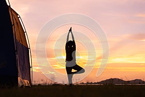 Asian young woman exercise and practice yoga sunset the relax nature background