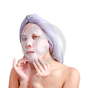 Asian young woman face, girl applying facial peel off mask