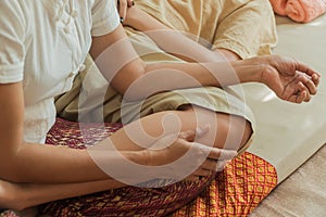 Asian young woman getting leg thai massage in spa.concept relaxation and health spa