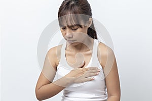 asian young woman having severe chest pain suffering from heart attack Isolated on white background