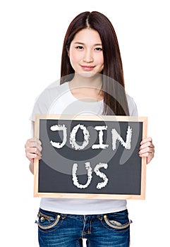 Asian young woman hold with chalkboard showing phrase of join us