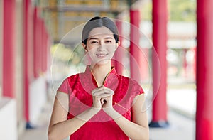 Asian young woman in old traditional Chinese dresses in the Temple