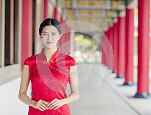 Asian young woman in old traditional Chinese dresses in the Temple