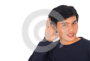 An Asianman in black shirt is covering his left ear with his han