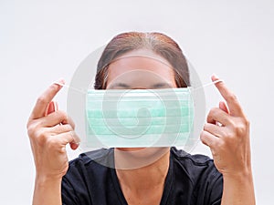 Asians woman with medical mask in hand to protection germs coronavirus or covid-19. concept prevent spread of