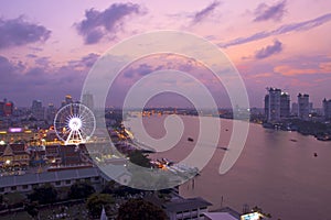 Asiatique against Chao Phraya river at twilight