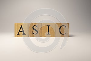 The ASIC code chain was created from wooden cubes. Industry and technology.