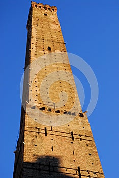 Asinelli tower in sun and blue skies in Bologna (Italy)