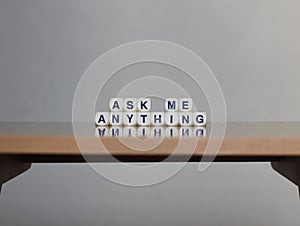 Ask me anything on wood table