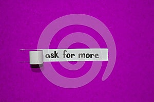 Ask for more, Inspiration, Motivation and business concept on purple torn paper
