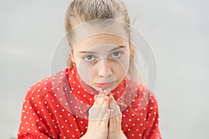 Ask permission. Banned behavior. Girl sad begging permission. Please concept. Girl helpless hold hands for pray. Let me