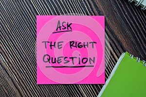 Ask The Right Question write on sticky notes isolated on office desk photo