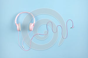 ASMR, Autonomous sensory meridian response, sensory meridian response concept with pink headphones on blur background