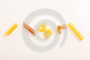 Asortment of five differen shape of pasta isolated over white.