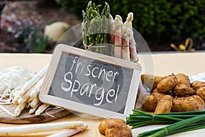 Asparagus with blackboard and german words