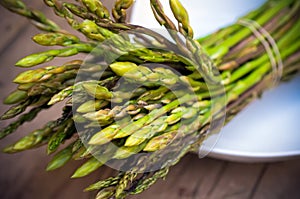 Asparagus bundle on dish