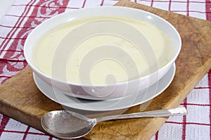 Asparagus cream soup in a white bowl