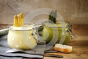 Asparagus cream soup white and green creative served in glass ja