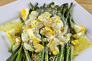 Asparagus with Egg Salad & Toasted Sesame Vinaigrette