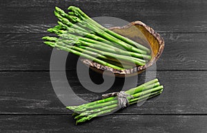 Asparagus green on dark black background