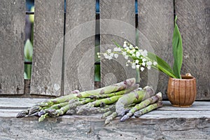 Asparagus with lilly of the valley flowers