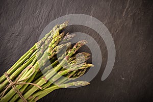 Asparagus over wooden background