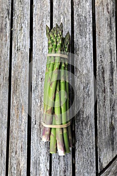 Asparagus on rustic wooden background