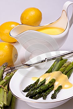 Asparagus with sauce photo