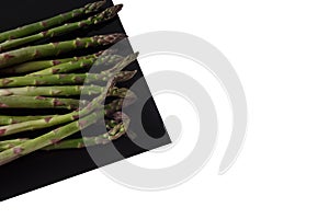 Asparges on Black Sheet Isolated on white