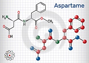 Aspartame, APM, molecule. Sugar substitute and E951. Sheet of paper in a cage. Structural chemical formula and molecule model photo