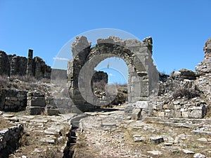 Aspendos, view of arched gate and ancient pathway led to Agora