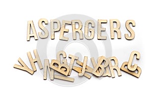 Aspergers concept, word spelled out in wooden letters photo