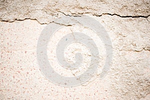 Asphalt close-up, wet concrete wall texture. Raw plaster wall background.