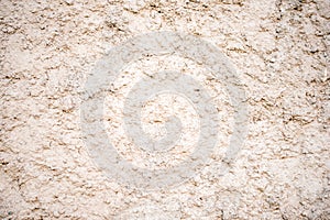 Asphalt close-up, wet concrete wall texture. Raw plaster wall background.