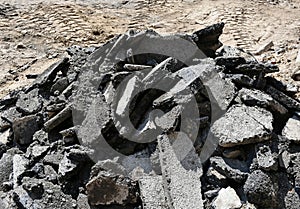 Asphalt construction material after braking the road