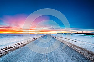 Asphalt Country Open Road Through Winter Snowy Fields And Meadow