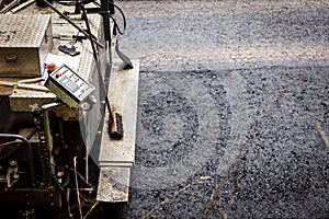 Asphalt finisher, paver constructing a asphalt road