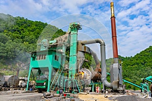 Asphalt hot mix plant. It is consists of cold aggregate system, drying system, dust collecting system, hot aggregate lifting, mixi