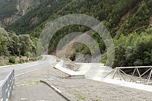 Asphalt mountain road and river