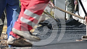 Asphalt paver applying asphalt