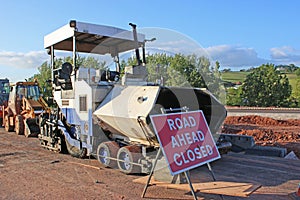Asphalt paver on a construction site