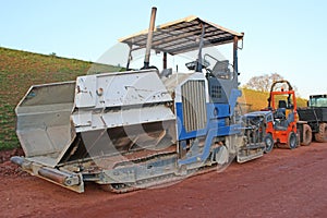 Asphalt paver on a construction site