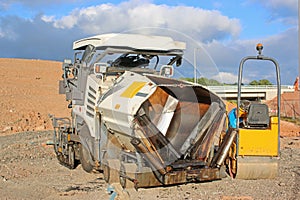 Asphalt paver on a construction site