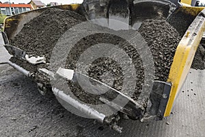 Asphalt paver machine during road construction and repairing works. A paver finisher, asphalt finisher or paving machine