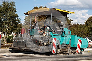 Asphalt paving machine photo