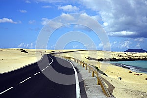 Asphalt road across desrt