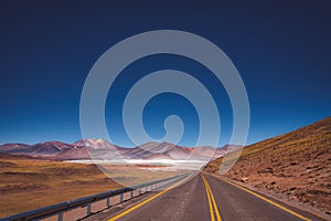 Asphalt road through the Atacama desert, Chile