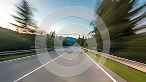 Asphalt road in Austria, Alps in a beautiful autumn day timelapse hyperlapse drivelapse