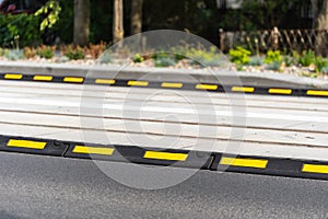 Asphalt road and boundary delineator for control traffic of city transport