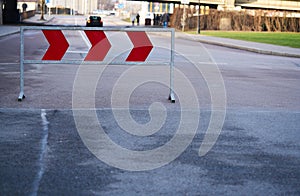 Asphalt road with chevron road signs